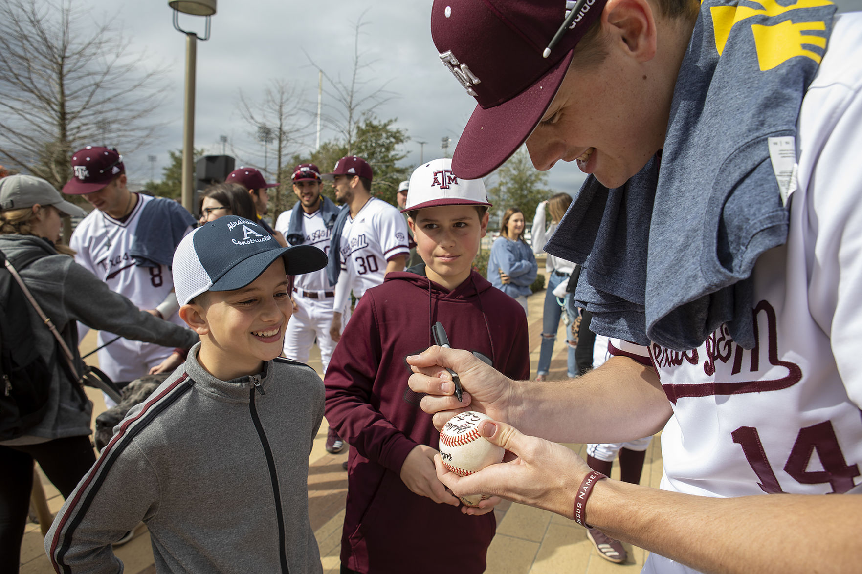 A&M baseball head shaving for cancer